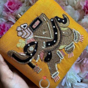 Jeweltrasury Hand embroidered clutch